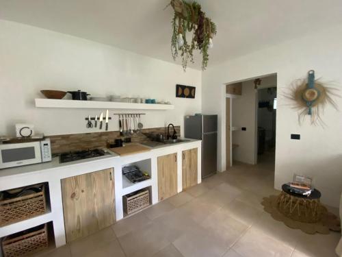 Kuchyň nebo kuchyňský kout v ubytování Xarraca