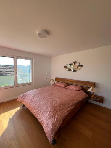 Ένα ή περισσότερα κρεβάτια σε δωμάτιο στο High-End-Haus mit Garten und Extras