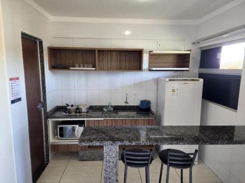 Кухня или мини-кухня в L'acqua Caldas Novas
