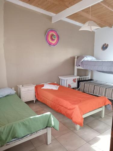 a bedroom with two bunk beds in a room at Paz in Tandil