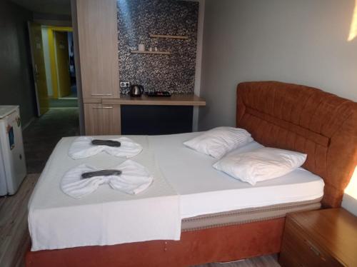 Ένα ή περισσότερα κρεβάτια σε δωμάτιο στο FUAR Home