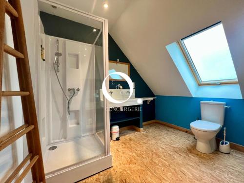 a bathroom with a shower and a toilet at COC - Le Gulistan in Wissant
