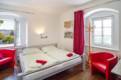 Ένα ή περισσότερα κρεβάτια σε δωμάτιο στο Hotel Na Velké hospodě