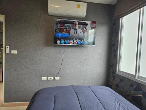 Een TV en/of entertainmentcenter bij Infinity Blue, High Speed Wi-Fi, Soft bed
