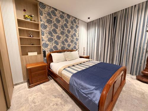 Postel nebo postele na pokoji v ubytování MetroSuite