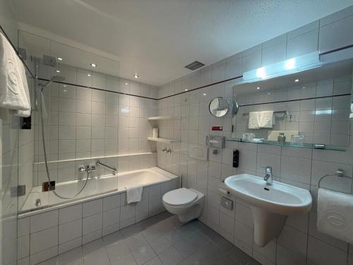 Koupelna v ubytování Hotel Germania