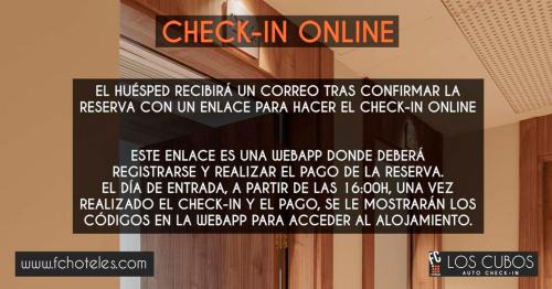 a sign that says check in online on a wall at FC Los Cubos Auto Check In in León