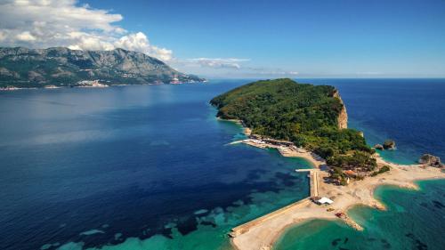an aerial view of an island in the ocean at Apartments Spin in Budva