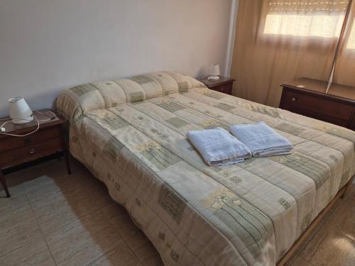 Postel nebo postele na pokoji v ubytování Atlántico Peatonal 2