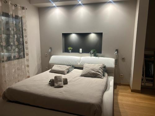 Postel nebo postele na pokoji v ubytování Villa de l’isle