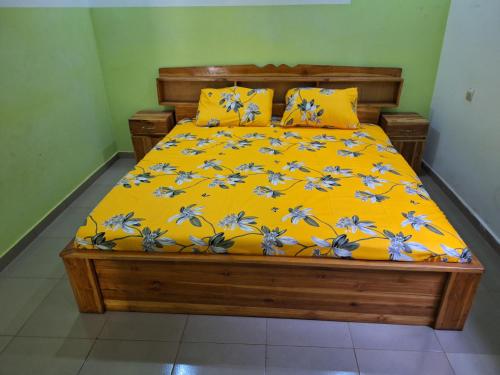 Llit o llits en una habitació de RESIDENCE DjABLE