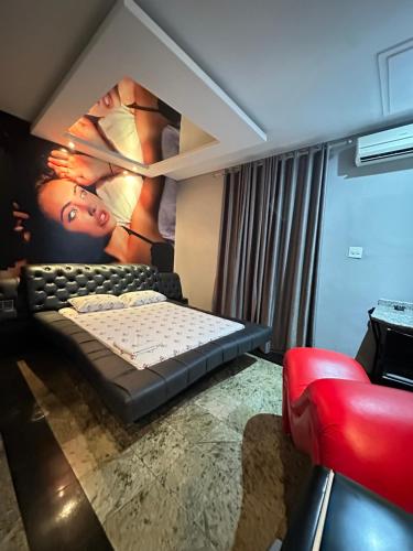 Un pat sau paturi într-o cameră la Motel Vitoria Reggia