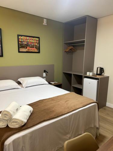 Cama o camas de una habitación en Belém Forest Inn