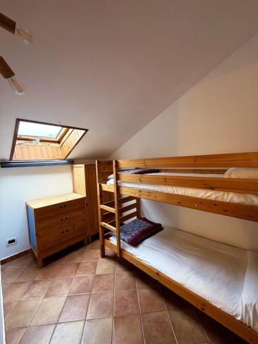 Voodi või voodid majutusasutuse Casa Mete - x 4 Persone- Garage - Vista Panoramica toas