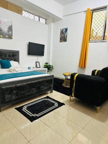 TV a/nebo společenská místnost v ubytování Charming studio