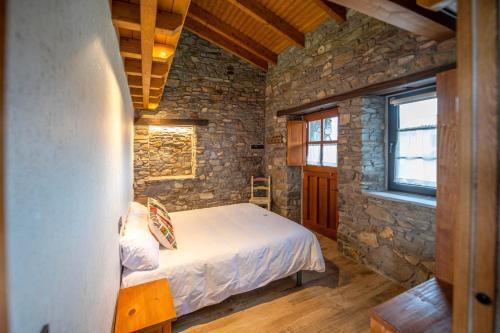 Postel nebo postele na pokoji v ubytování Apartamentos La Lozana