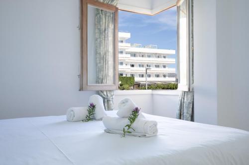 En eller flere senge i et værelse på Apartamento Reganyol by Rentallorca