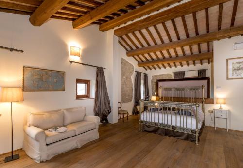 Ένα ή περισσότερα κρεβάτια σε δωμάτιο στο Villa dei Cavalli