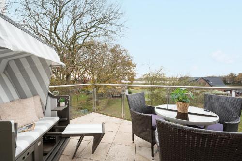 Balkón nebo terasa v ubytování Bürgermeister-Fox 44a Fehmarn Brise