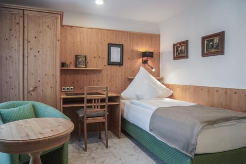 Ένα ή περισσότερα κρεβάτια σε δωμάτιο στο Hotel Garni in der Breite