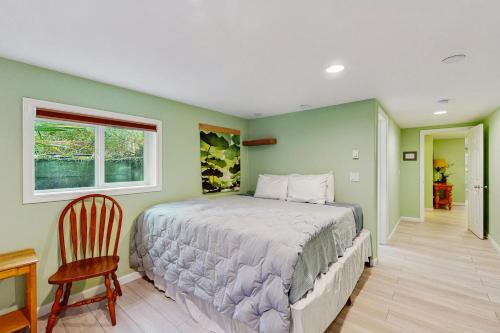 Giường trong phòng chung tại Light & Leisure