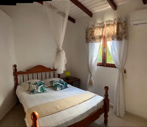 Postel nebo postele na pokoji v ubytování Ciel Caraibe