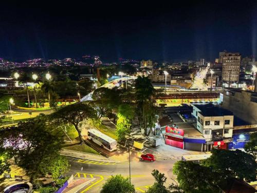 a view of a city at night with at Stratus Centro Hotel in Volta Redonda