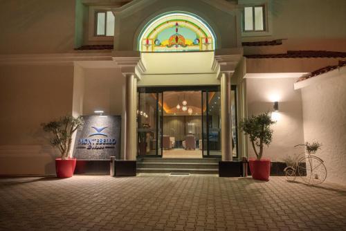 a entrance to a building with a stained glass window at Montebello Deluxe Hotel in Oludeniz