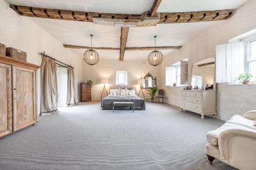 Ένα ή περισσότερα κρεβάτια σε δωμάτιο στο Cutteridge House