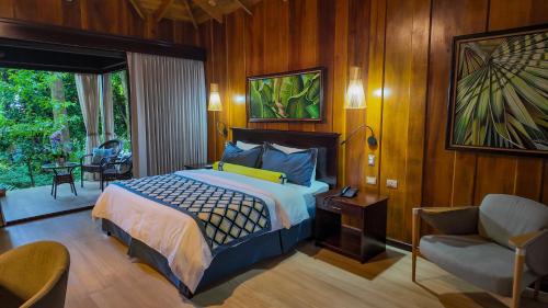 Кровать или кровати в номере Hotel Lomas del Volcan