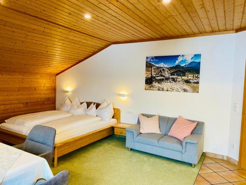 Ένα ή περισσότερα κρεβάτια σε δωμάτιο στο Haus Plattenkar