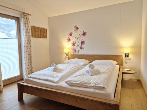 Postel nebo postele na pokoji v ubytování Chalet Noriker