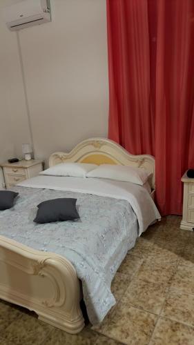 Ένα ή περισσότερα κρεβάτια σε δωμάτιο στο Il Girasole di Maury e Barby