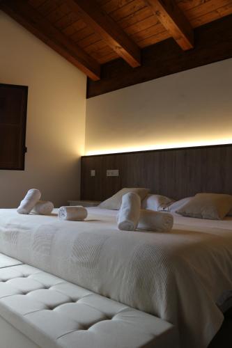 Ένα ή περισσότερα κρεβάτια σε δωμάτιο στο La Huerce Silvestre - apartamento abuela