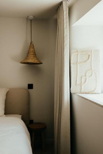 Ένα ή περισσότερα κρεβάτια σε δωμάτιο στο B&B Zuidhoute