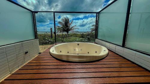 Ένα μπάνιο στο Flat Alta Garden pé na areia, Praia do Bessa