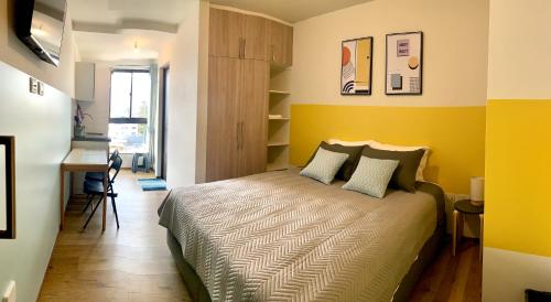 Ένα ή περισσότερα κρεβάτια σε δωμάτιο στο Studio Memphis in El Prado