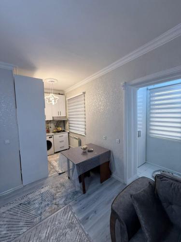 Kuchyň nebo kuchyňský kout v ubytování City Center Apartment