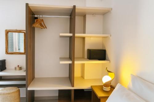 Ein Bett oder Betten in einem Zimmer der Unterkunft Erifili's Apartments