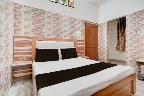 Ένα ή περισσότερα κρεβάτια σε δωμάτιο στο Hotel O prream view