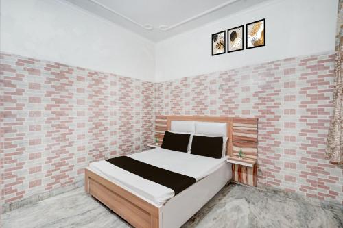 Ένα ή περισσότερα κρεβάτια σε δωμάτιο στο Hotel O prream view