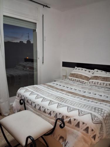 Ένα ή περισσότερα κρεβάτια σε δωμάτιο στο Cal Robert