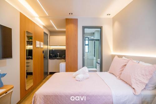 Postel nebo postele na pokoji v ubytování Flats no Mares de Cabo Branco by QAVI