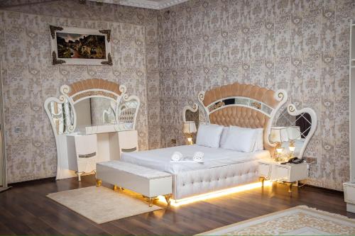 Postel nebo postele na pokoji v ubytování Milano Hotel