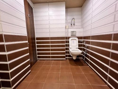 Koupelna v ubytování GS Cottages near Mall Road