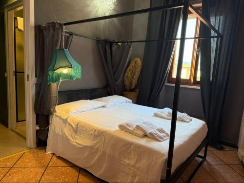 Postel nebo postele na pokoji v ubytování Casa Rinchiosa