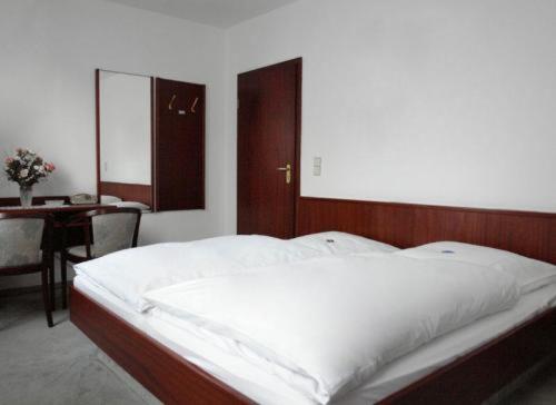 Tempat tidur dalam kamar di Hotel Filoxenia