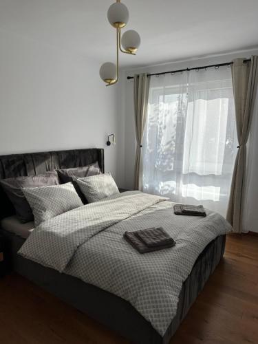 Postel nebo postele na pokoji v ubytování Arigato