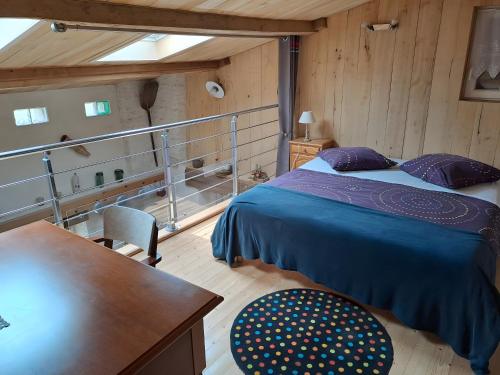 Ένα ή περισσότερα κρεβάτια σε δωμάτιο στο Gite L'Etable