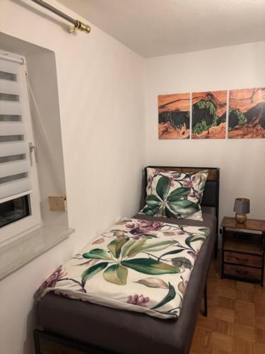 Ένα ή περισσότερα κρεβάτια σε δωμάτιο στο Ferien - Monteurwohnung Roding